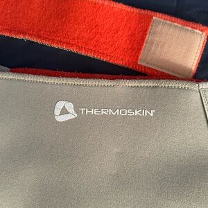 Thermoskin Beige and Orange Knee Support